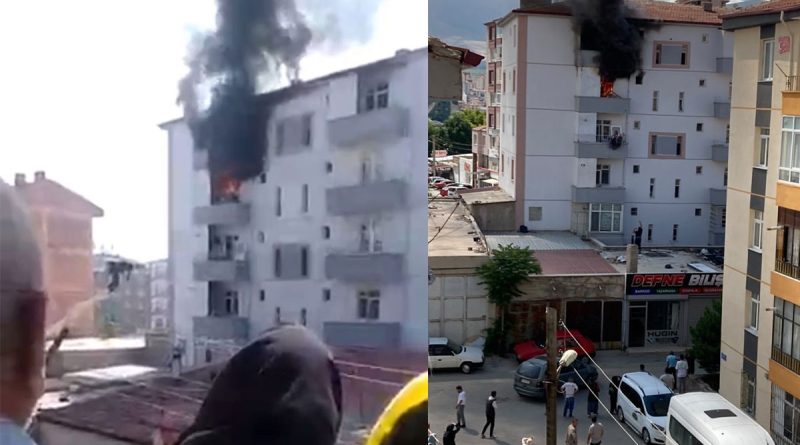 Yangında balkondan atlayan kadını havada tuttu