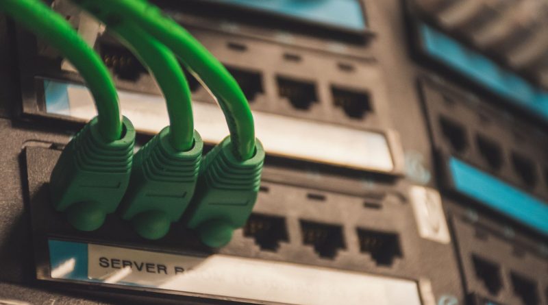 close up of network cables with server ports